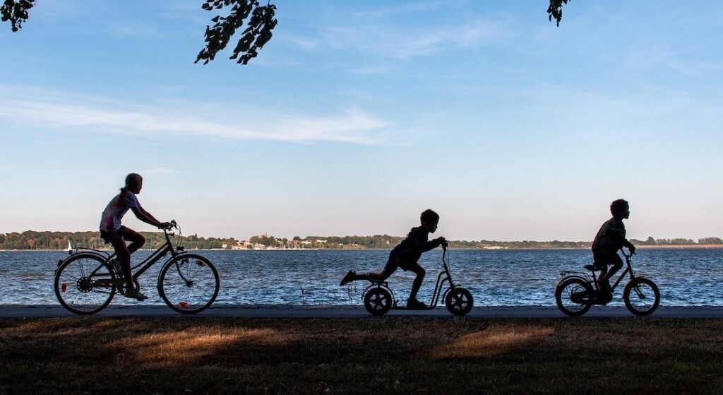 Scooter People Riding Bikes